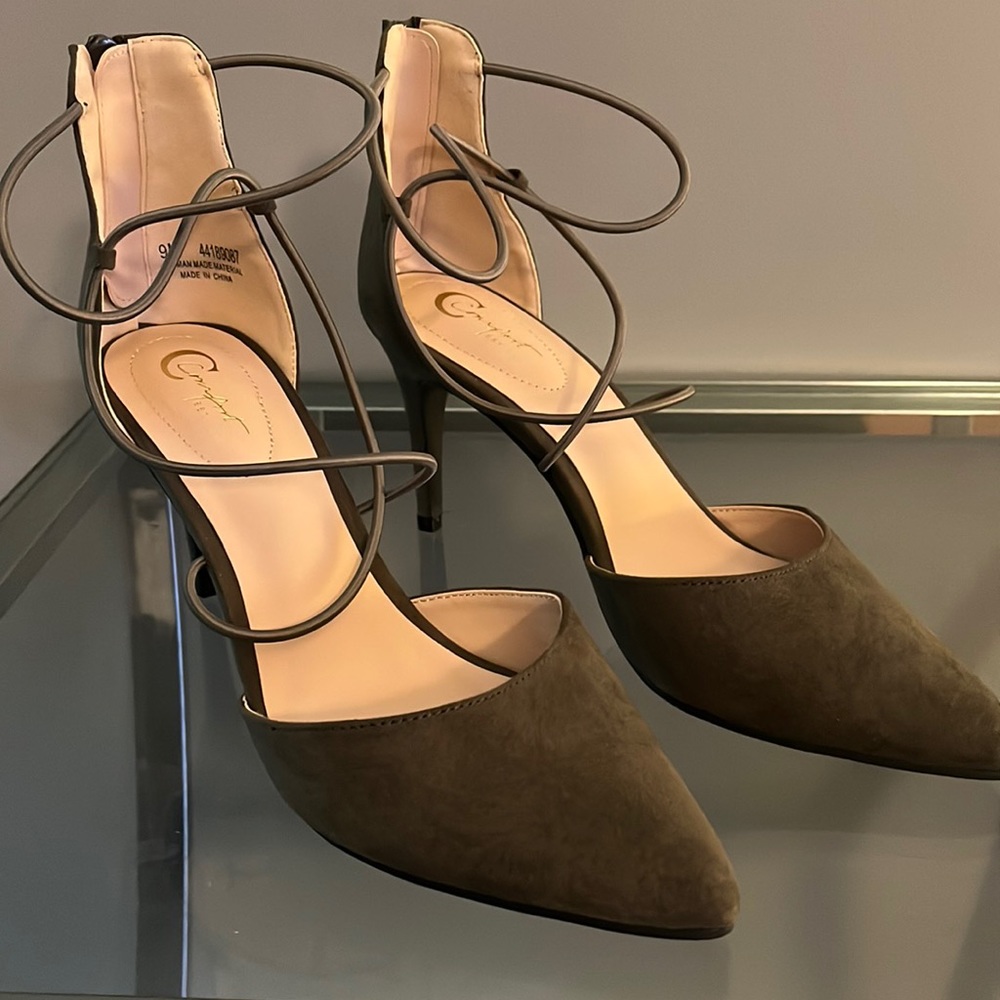 Green suede women’s shoes.